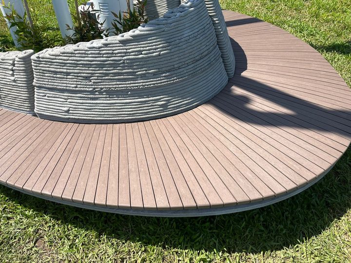 Tamar Park 添馬公園 composite wood bench Hong Kong — photo 1